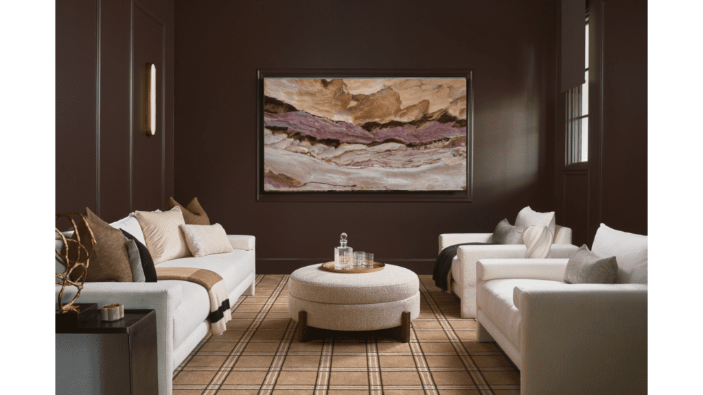 Luxury home theater with moody brown walls, plush seating, and cozy design by Smyth House